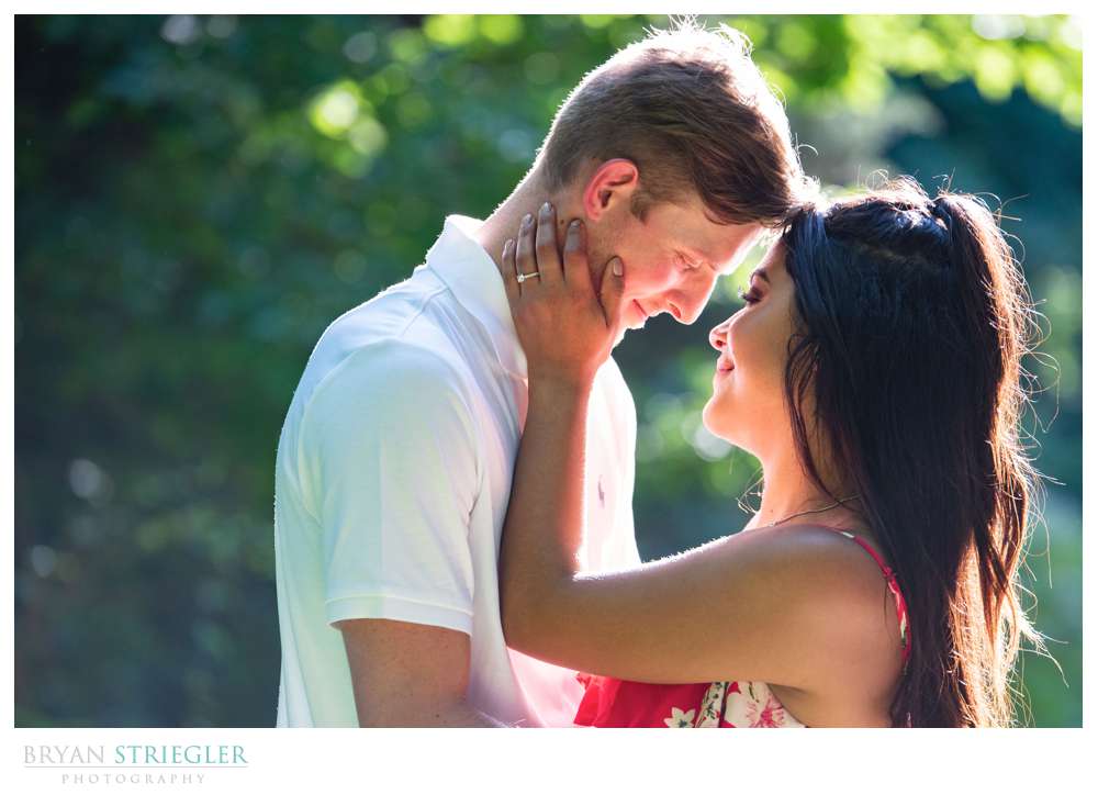heads together engagement photo